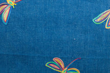 denim met libelle borduursel